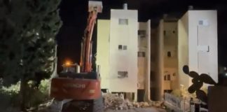 بالفيديو:- بلدية حيفا تهدم المبنى الذي أصابه الصاروخ’ من لبنان أمس خشية انهياره