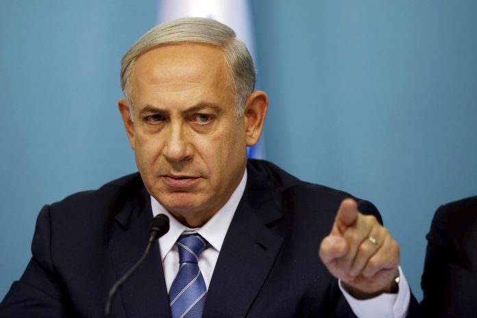 Israel's Prime Minister Netanyahu gestures as he speaks during a news conference in Jerusalem