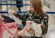 صورة إنسانية من مطار بيروت… معاون أوّل تحتضن طفلة